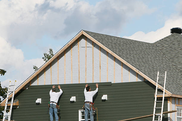 Professional Emergency Siding Repair technician working in Paris, OH